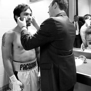 Dr. Jeffrey J. Roth looking at Manny Pacquiao's face after a boxing match