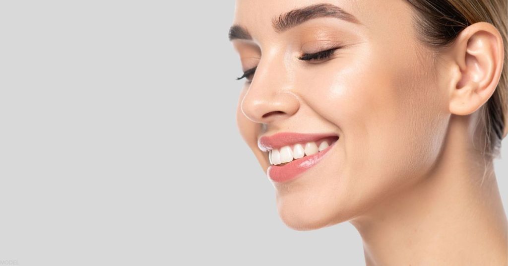 Smiling young woman (model)