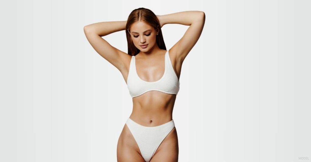 Confident woman in bra and underwear. (Model)